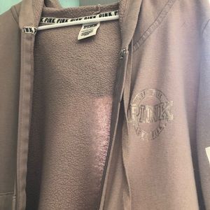 A pink (brand) jacket.